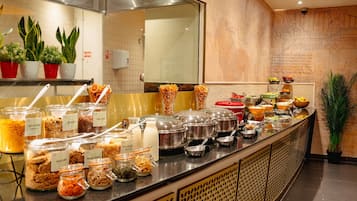 Desayuno completo (GBP 17.50 por persona)