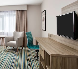 1 chambre, minibar, bureau, fer et planche à repasser