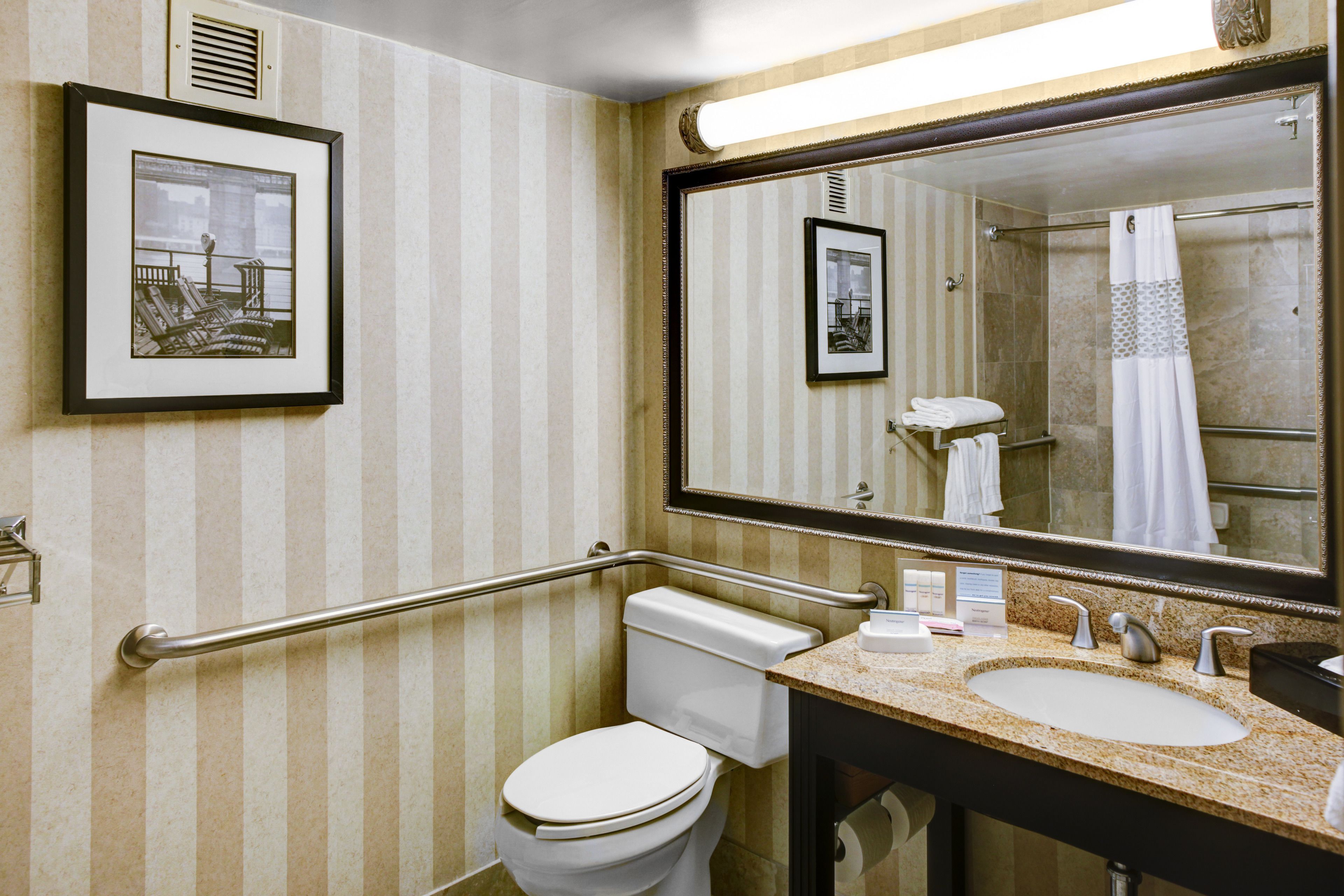 combined shower/bathtub, free toiletries, hair dryer, towels