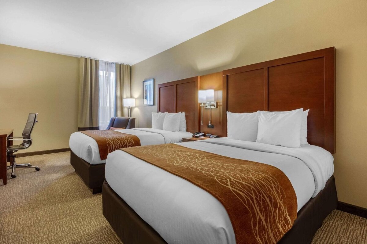 Premium bedding, pillowtop beds, desk, laptop workspace