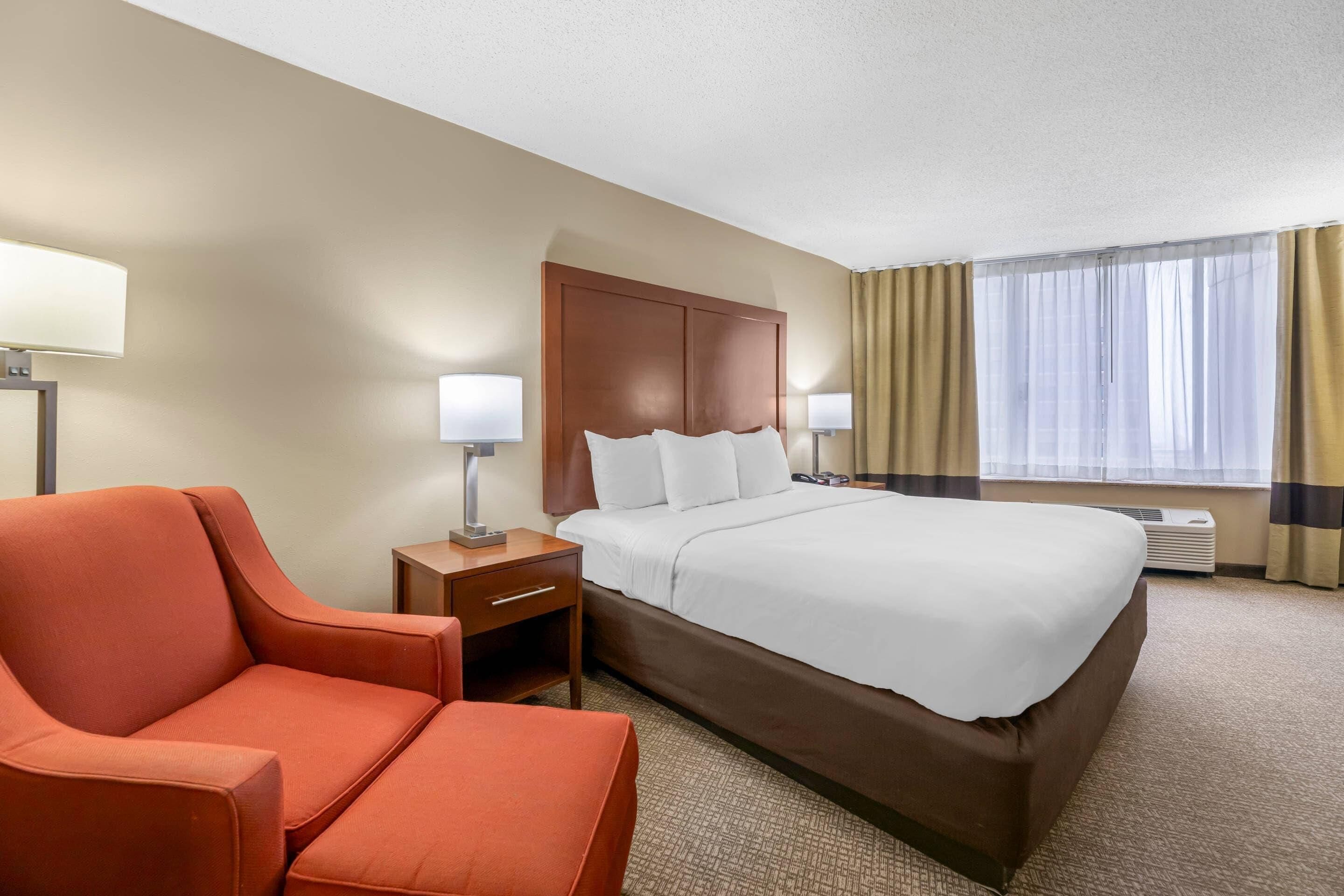 Premium bedding, pillow-top beds, desk, laptop workspace