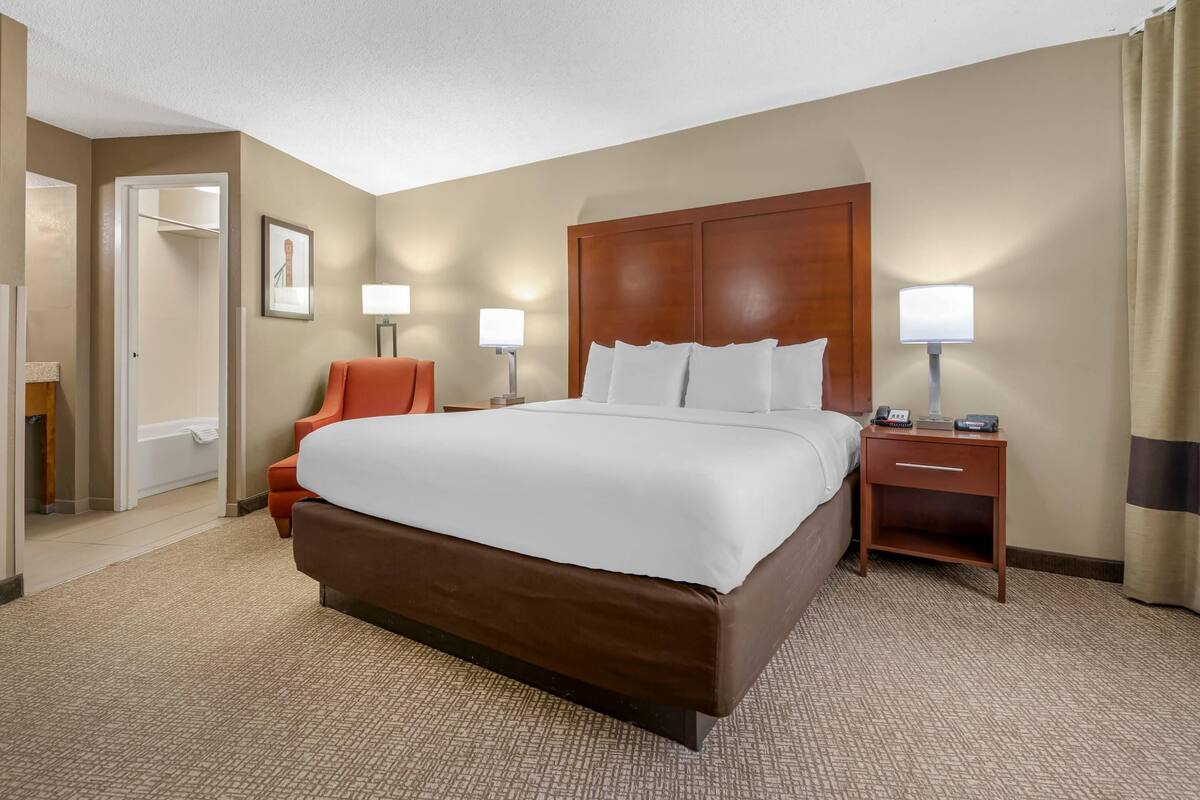 Premium bedding, pillow-top beds, desk, laptop workspace