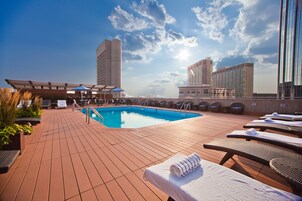 Seasonal outdoor pool, cabanas (surcharge), pool umbrellas
