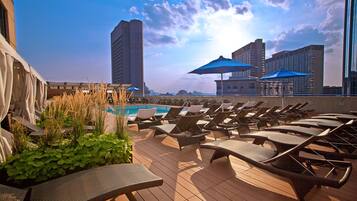 Seasonal outdoor pool, cabanas (surcharge), pool umbrellas