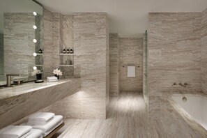 Designer toiletries, hair dryer, bathrobes, slippers