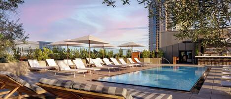 Outdoor pool, open 7:00 AM to 8:00 PM, pool cabanas (surcharge)
