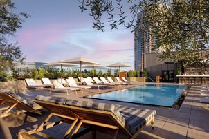 Outdoor pool, open 7:00 AM to 8:00 PM, cabanas (surcharge)