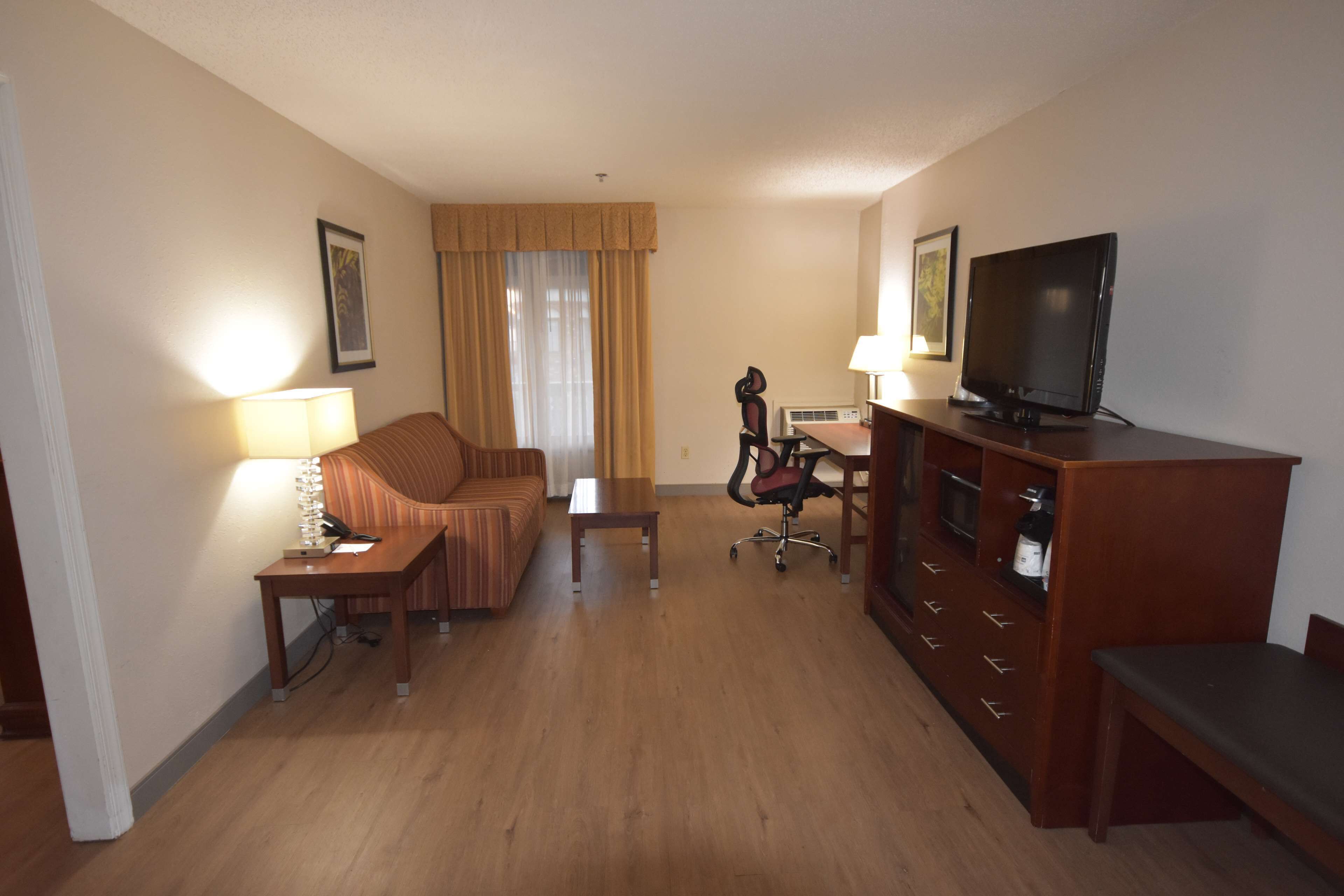 suite, 2 queen beds, non smoking, refrigerator & microwave (with sofabed) | in-room safe, desk, laptop workspace, blackout curtains