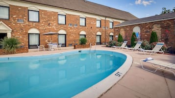 Seasonal outdoor pool, pool umbrellas, pool loungers