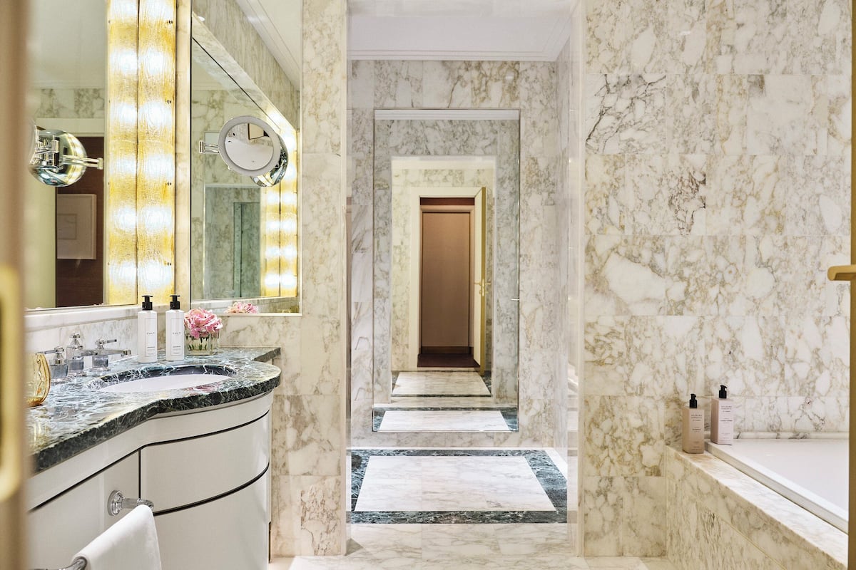 separate bathtub and shower, designer toiletries, hair dryer, bathrobes