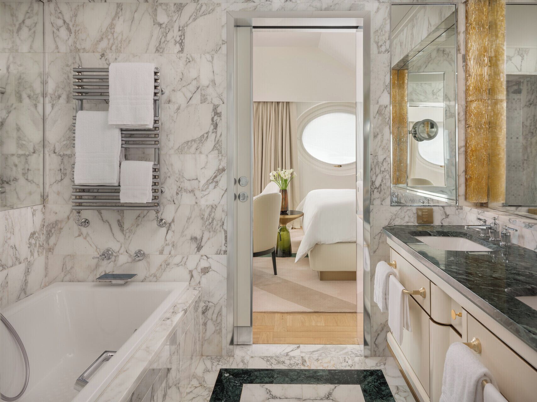 Separate tub and shower, designer toiletries, hair dryer, bathrobes