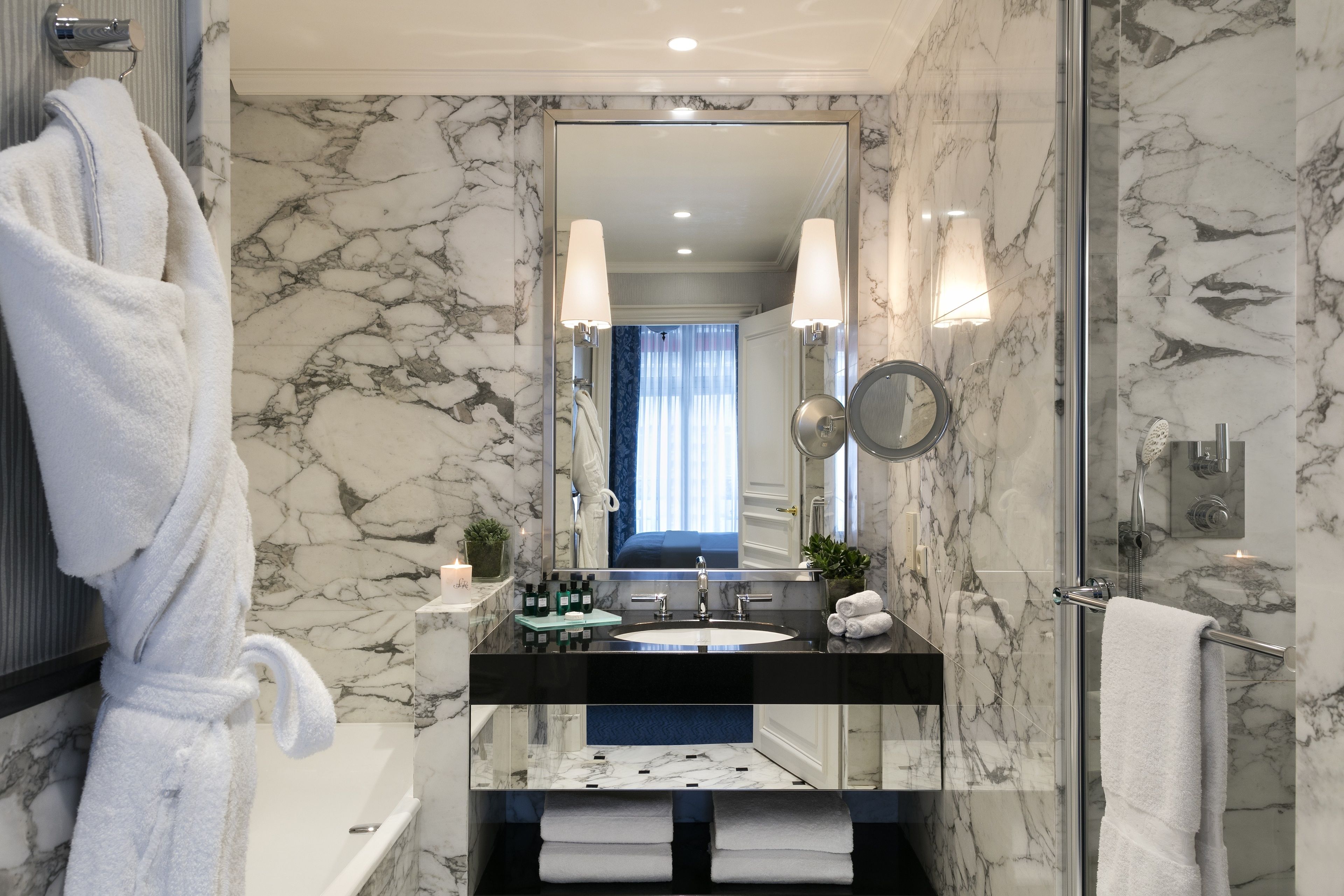 junior suite | bathroom | designer toiletries, hair dryer, bathrobes, slippers