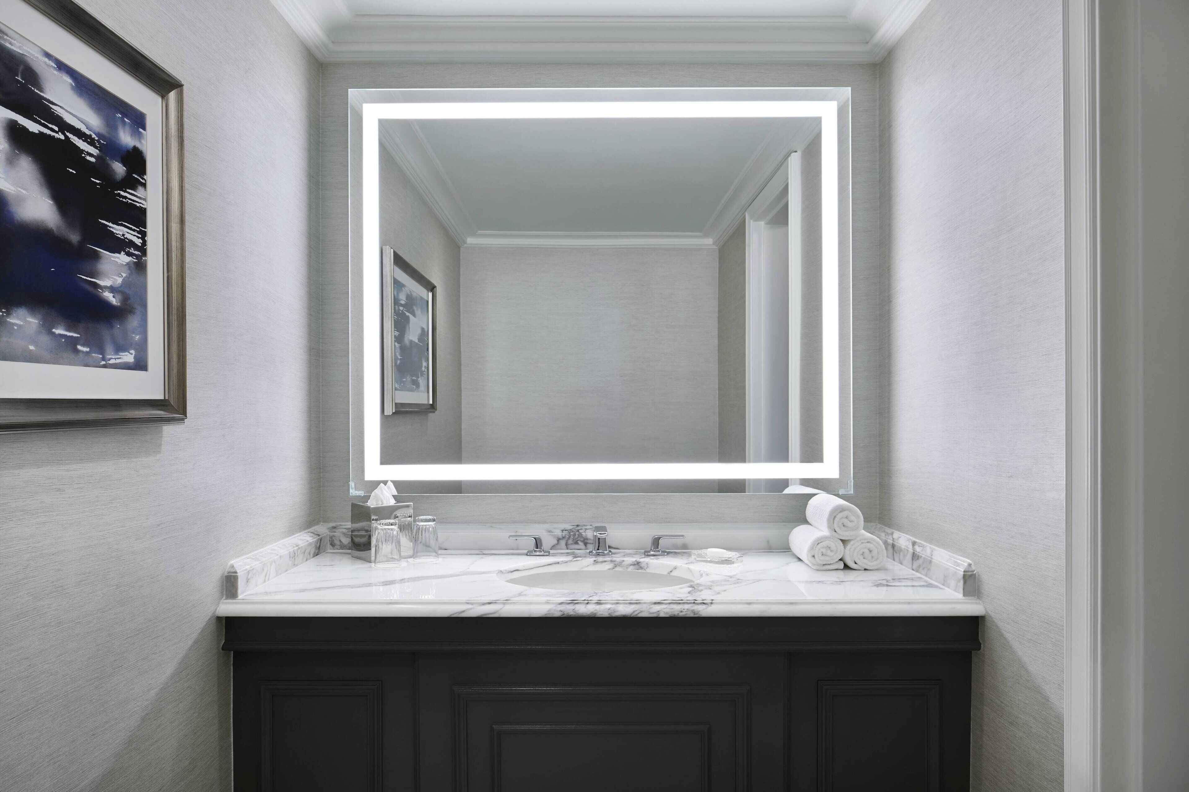 designer toiletries, hair dryer, bathrobes, towels