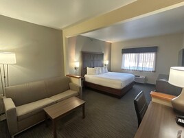 Premium bedding, pillow-top beds, desk, laptop workspace