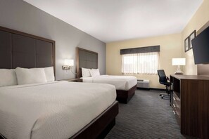 Premium bedding, pillowtop beds, desk, laptop workspace
