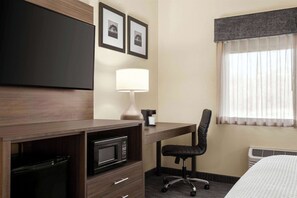 Premium bedding, pillowtop beds, desk, laptop workspace