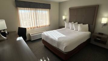 Premium bedding, pillowtop beds, desk, laptop workspace