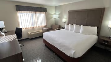 Premium bedding, pillow-top beds, desk, laptop workspace