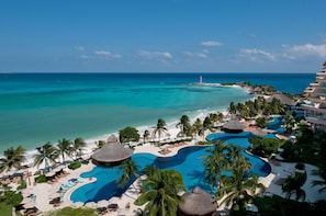 4 outdoor pools, open 7:00 AM to 9:00 PM, pool cabanas (surcharge)