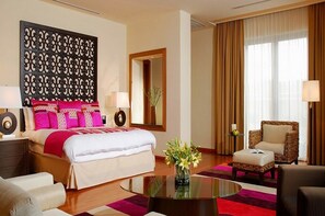 Premium bedding, down comforters, pillowtop beds, free minibar