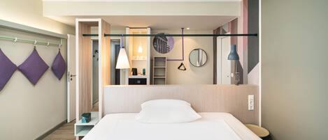 Hypo-allergenic bedding available, in-room safe, desk, laptop workspace