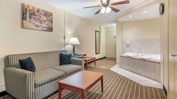 Suite, 1 King Bed, Non Smoking, Jetted Tub (with Sofabed) | Desk, laptop workspace, iron/ironing board, WiFi