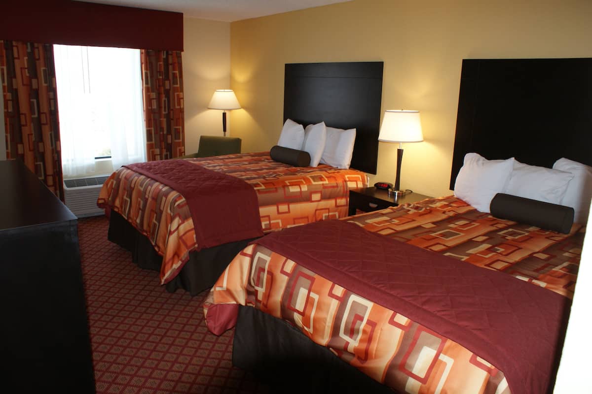Premium bedding, pillowtop beds, desk, blackout drapes