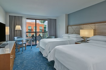 Premium bedding, down comforters, pillowtop beds, in-room safe at Walt Disney World Dolphin