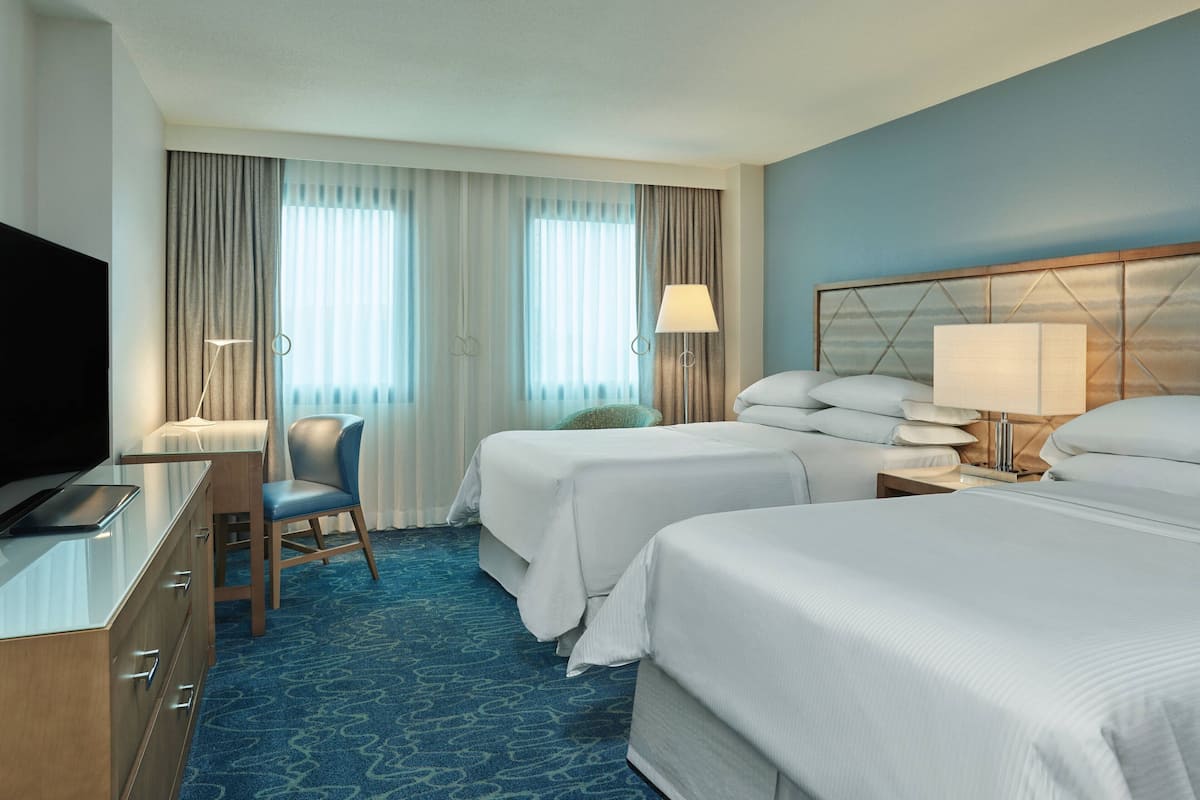 Premium bedding, down comforters, pillowtop beds, in-room safe