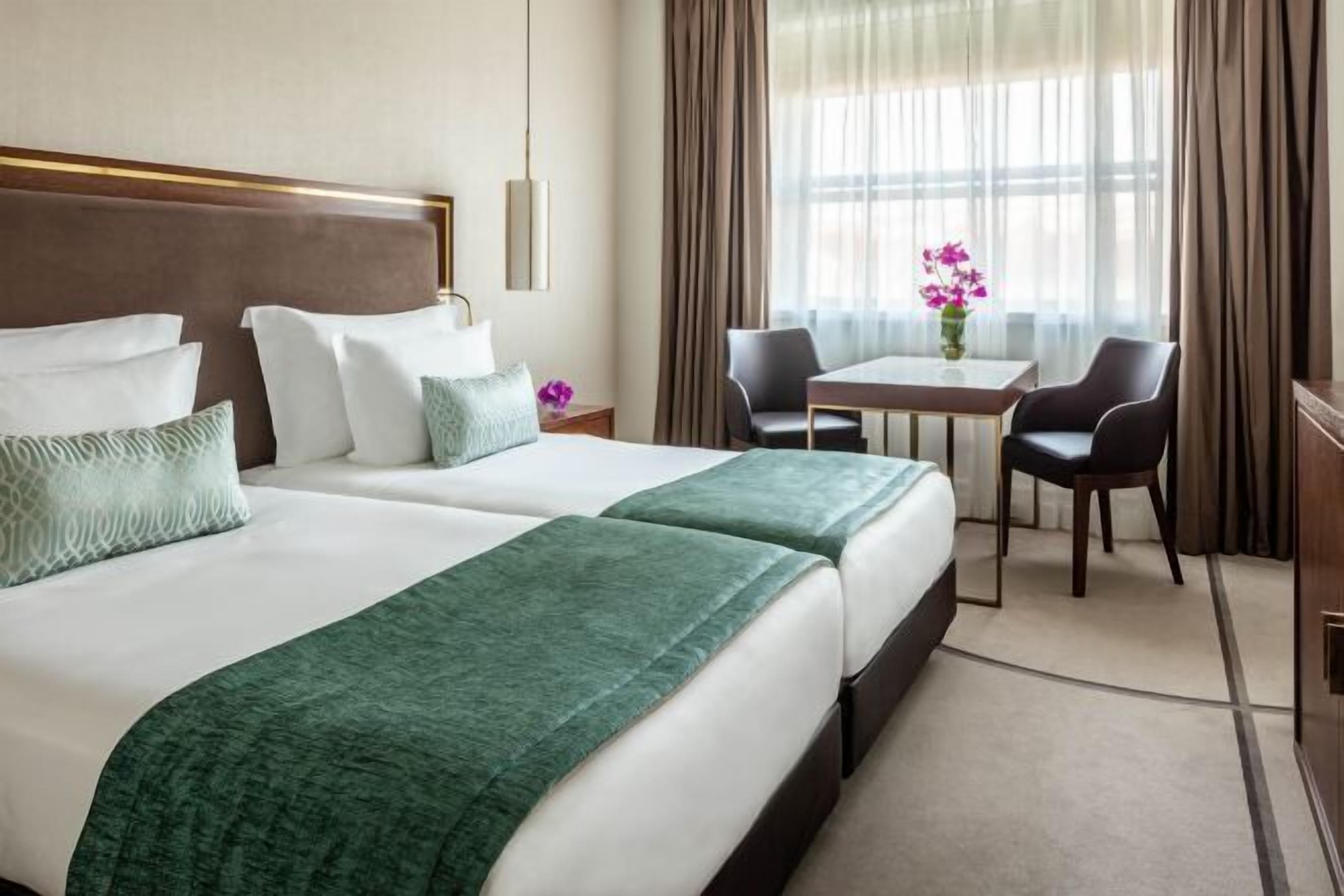 Hypo-allergenic bedding, down duvets, minibar, in-room safe