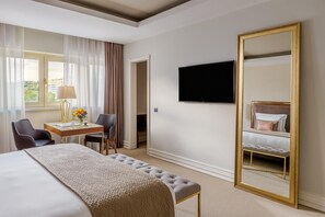 Hypo-allergenic bedding, down comforters, minibar, in-room safe