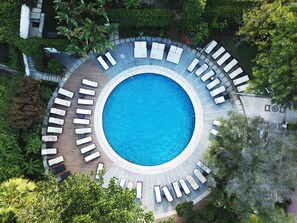 Seasonal outdoor pool, pool umbrellas, sun loungers