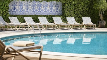 Seasonal outdoor pool, pool umbrellas, sun loungers