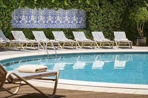Seasonal outdoor pool, pool umbrellas, pool loungers