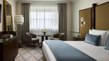 1 bedroom, hypo-allergenic bedding, down comforters, minibar