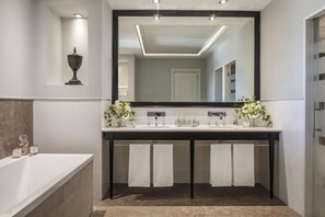 Eco-friendly toiletries, hair dryer, bathrobes, slippers