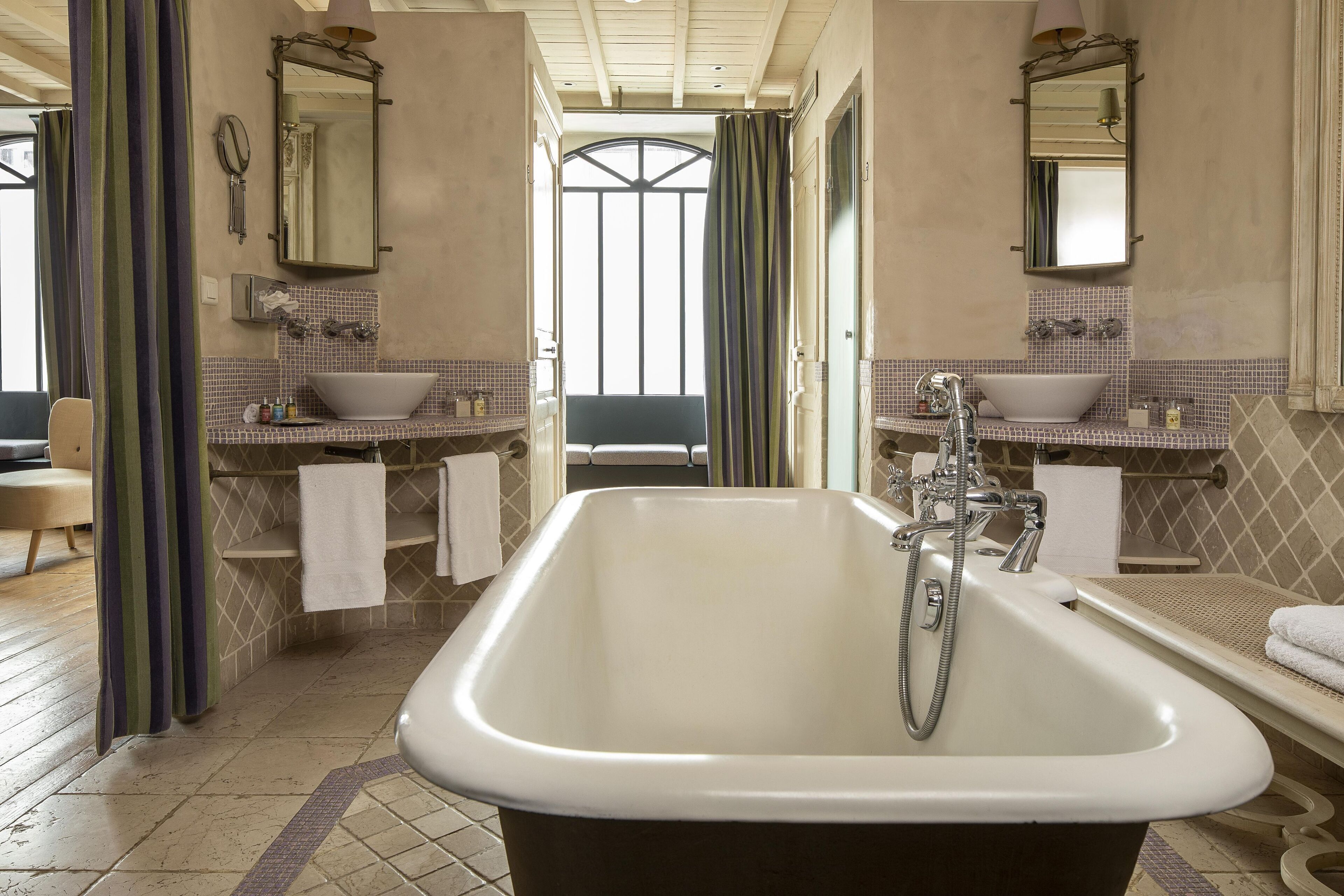 suite | bathroom | combined shower/bathtub, free toiletries, hair dryer, bathrobes