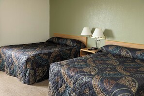 Premium bedding, desk, laptop workspace, blackout curtains