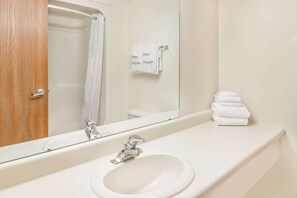 Combined shower/bathtub, free toiletries, hair dryer, towels - Days Inn by Wyndham Alpena (Alpena)