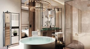 A modern bathroom with a freestanding bathtub, a large mirror, and a chandelier. - Waldorf Astoria Kuala Lumpur (Kuala Lumpur)