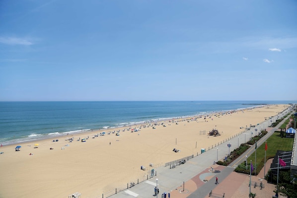 On the beach, white sand, sun-loungers