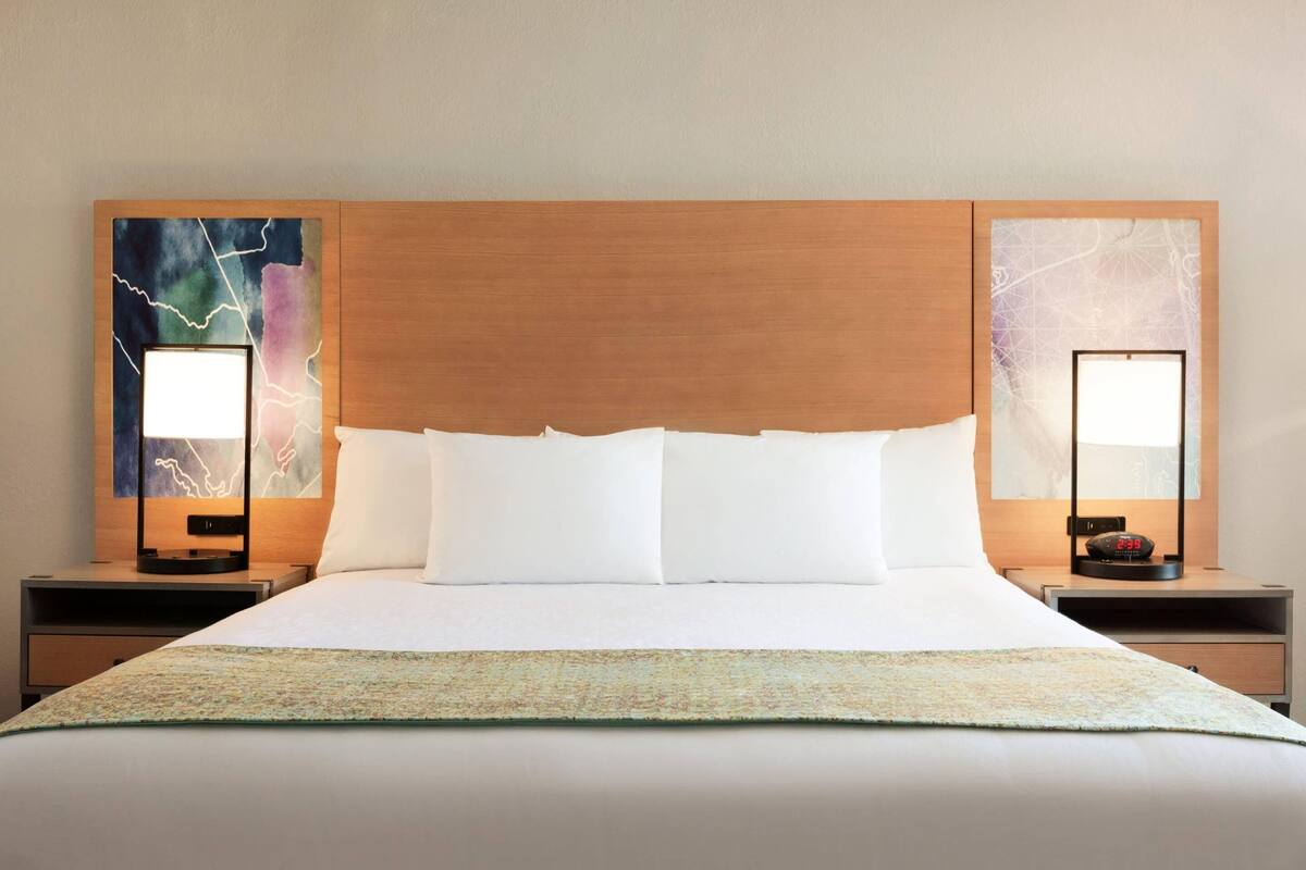 Hypo-allergenic bedding available, in-room safe, desk, laptop workspace