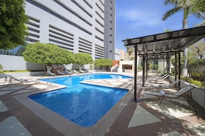 Outdoor pool, pool umbrellas, pool loungers