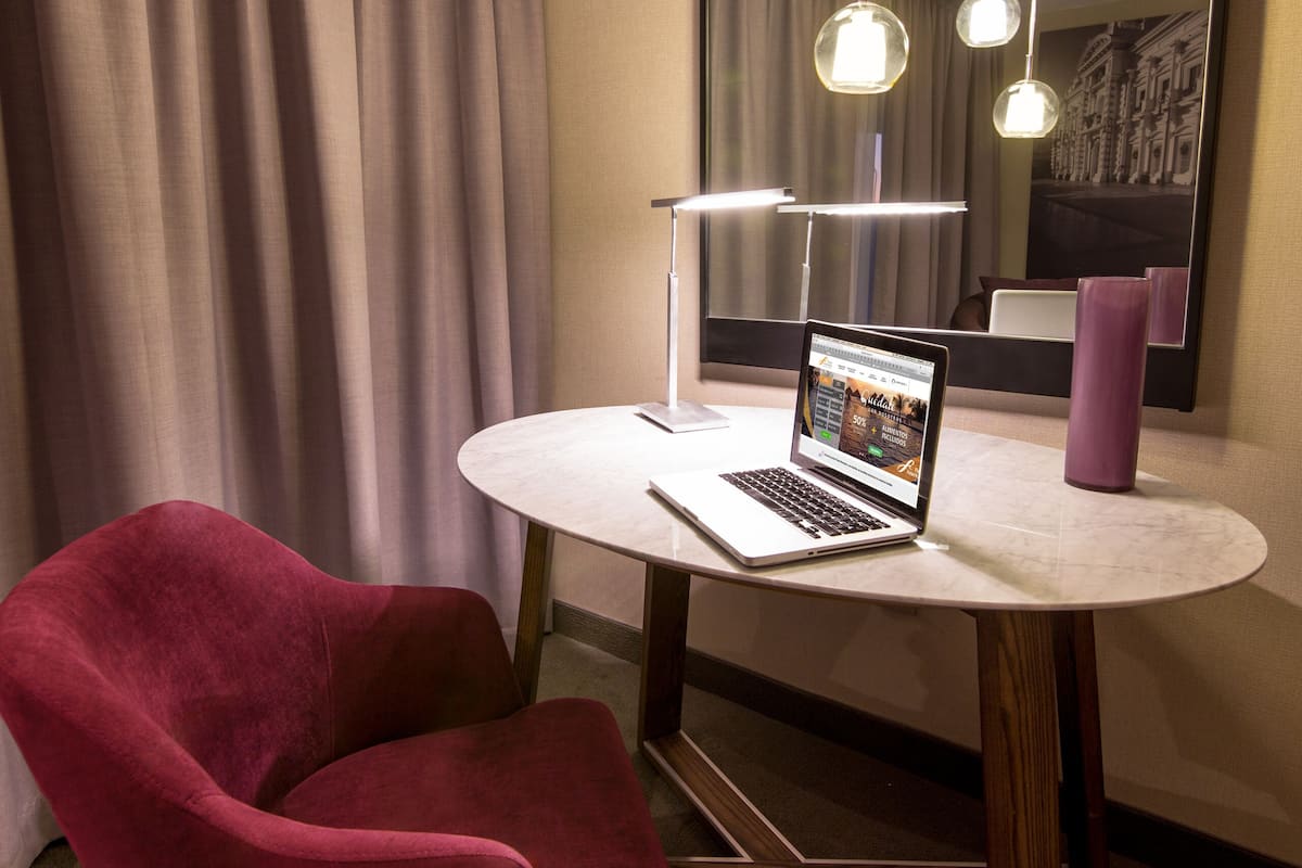 Down duvets, pillow-top beds, minibar, in-room safe