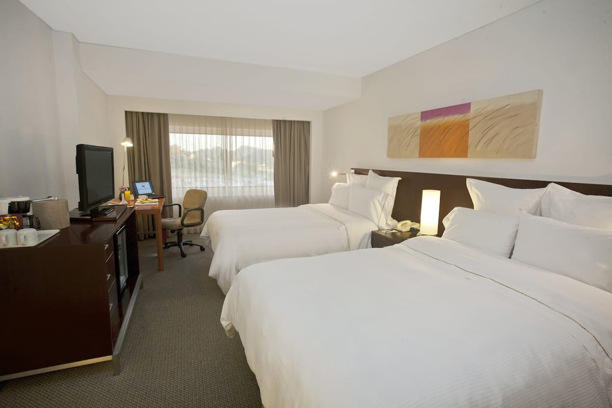 Deluxe Double Room | Minibar, in-room safe, desk, blackout curtains