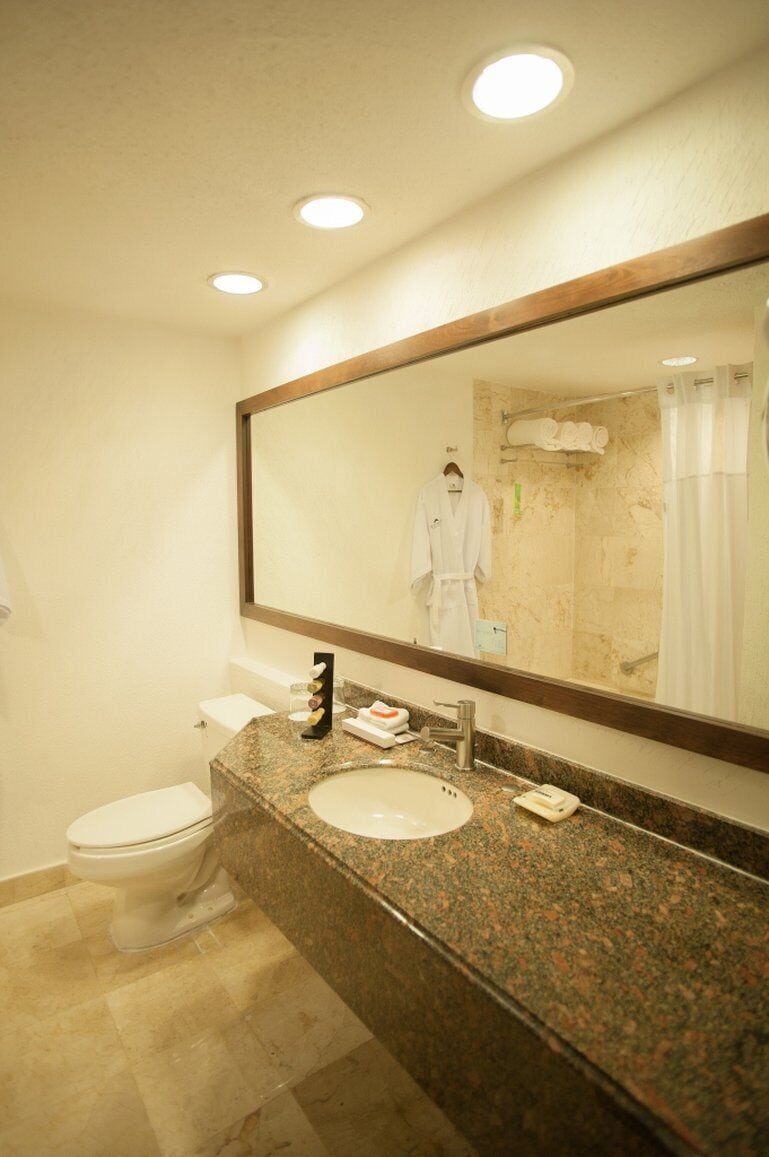 eco-friendly toiletries, hair dryer, towels, soap