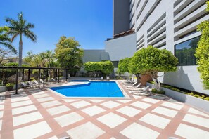 Outdoor pool, pool umbrellas, pool loungers