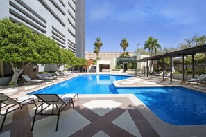 Outdoor pool, pool umbrellas, pool loungers