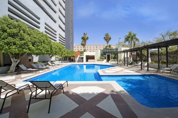 Outdoor pool, pool umbrellas, pool loungers