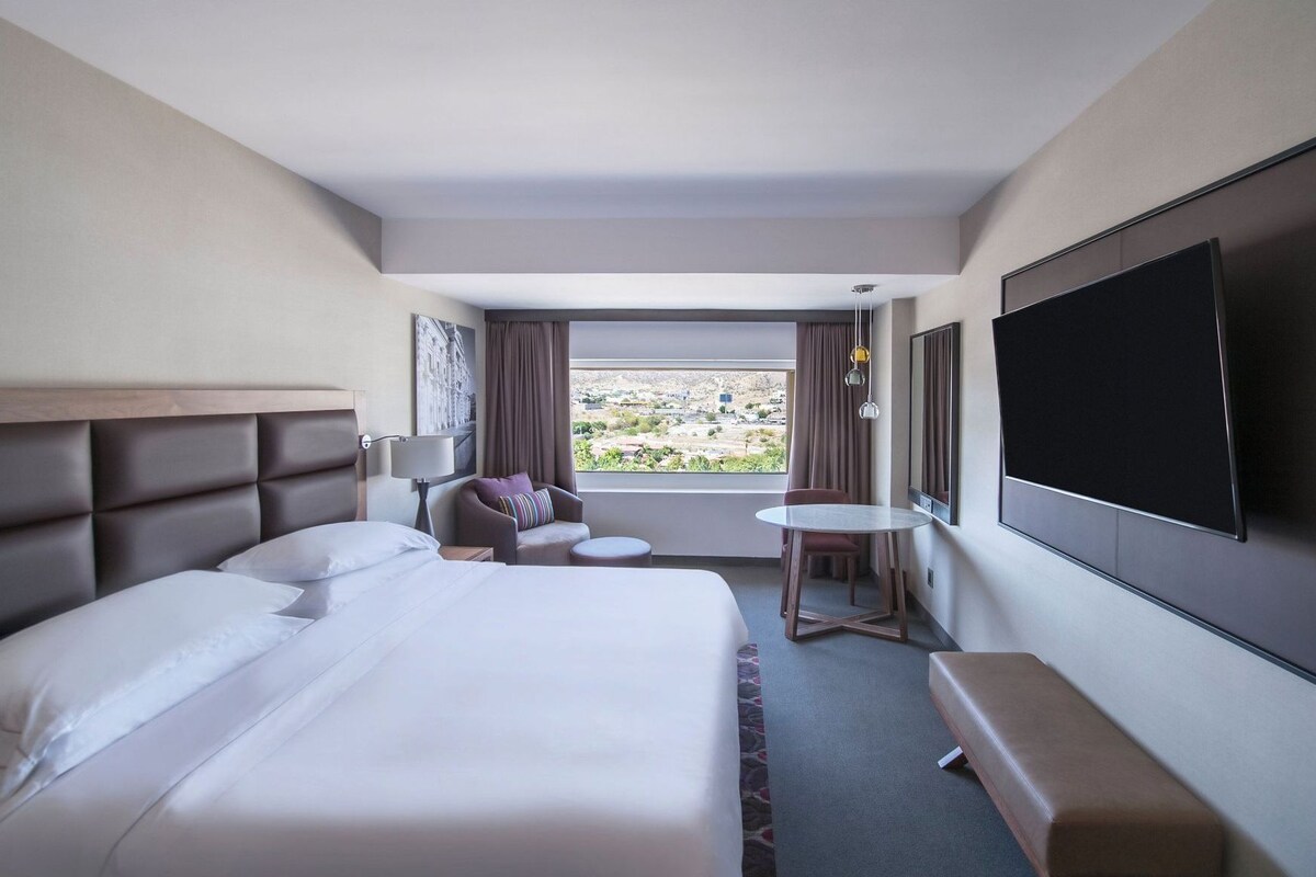 Down duvets, pillow-top beds, minibar, in-room safe